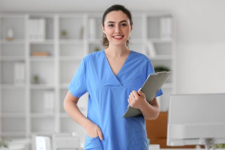 Female,Medical,Assistant,With,Clipboard,In,Clinic